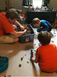 Dad joining the Lego challenge for kids