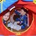 2 boys playing with the best gift for kids stuck at home featured image