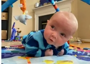 a baby enjoying tummy time