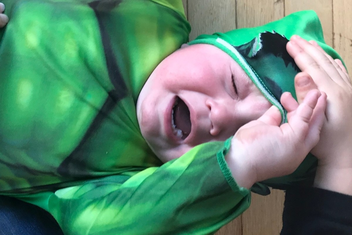 a toddler throwing a tantrum
